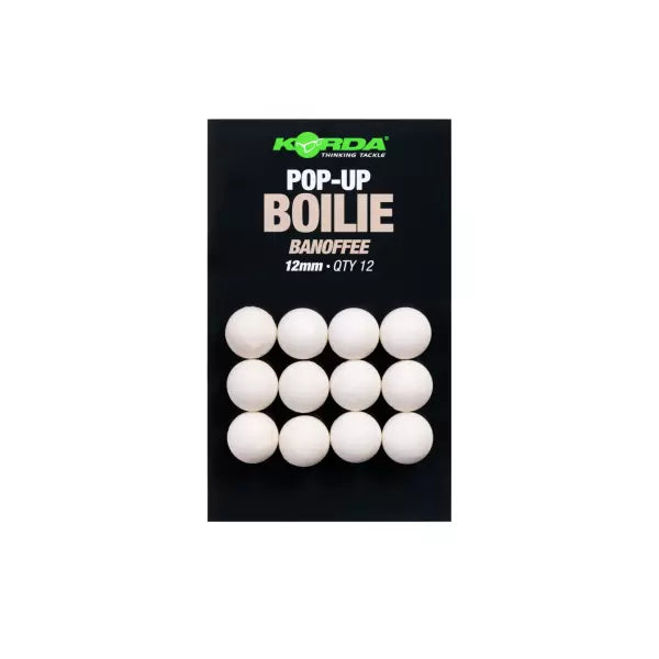 A pack of 12 Korda Pop-Up Boilie fishing lures on a black backing card, shown against a plain white background.