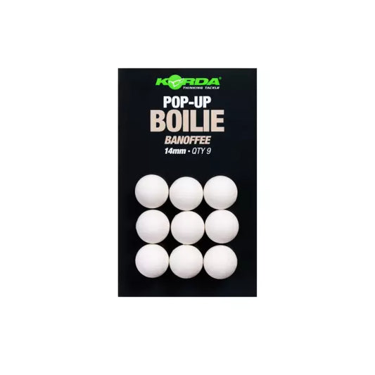 Korda Pop-Up Boilie Banoffee 14mm fishing lures in a black retail pack containing nine white pop-up boilies.