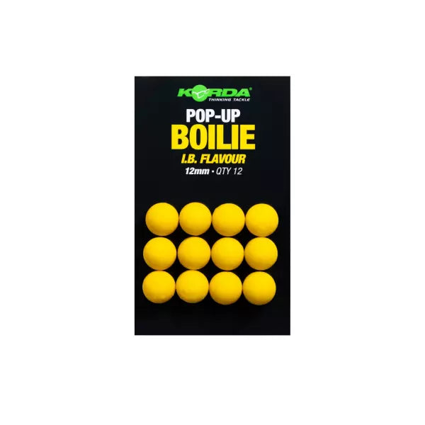 A package of Korda Pop-Up Boilie IB. Flavour 12mm fishing boilies, showing 12 bright yellow balls arranged in a grid on a black background with green and yellow text.