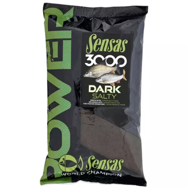A bag of Sensas 3000 Dark Salty fishing bait, featuring a black and green packaging design with a clear window showing the dark brown bait inside.