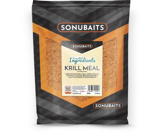A 300g bag of Sonubaits Krill Meal, featuring a black and orange design with a clear window showing the brown krill meal inside.